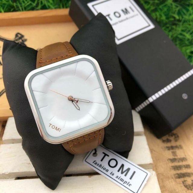 Tomi T-093 watch featuring a square dial and a black leather strap.