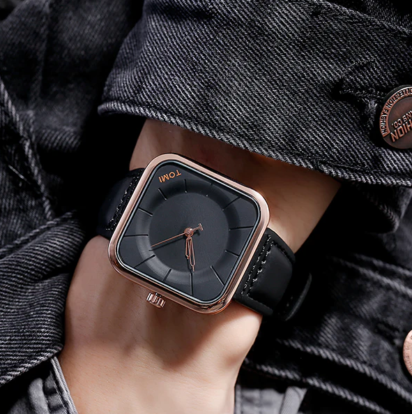 Tomi T-093 watch featuring a square dial and a black  leather strap.