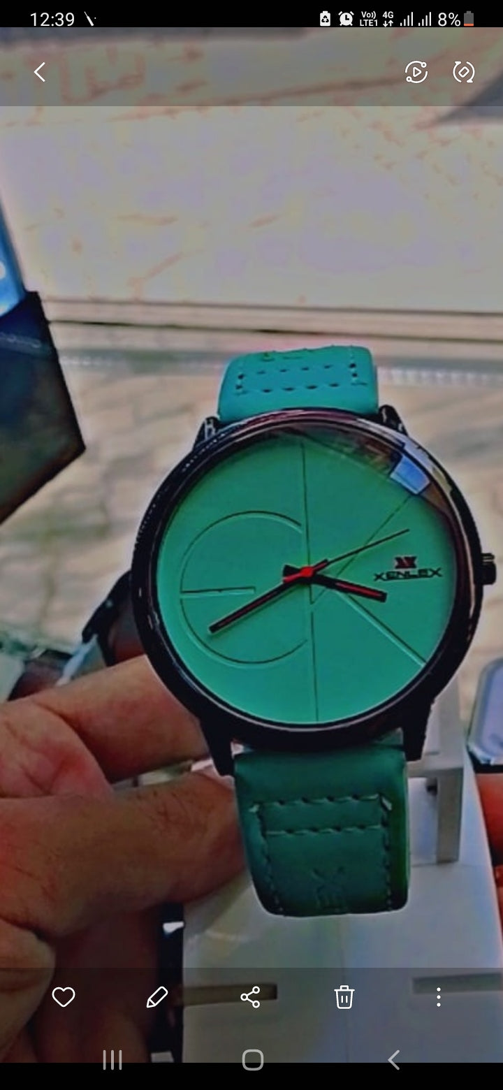 Xenlex brand analog watch green dial and matching leather